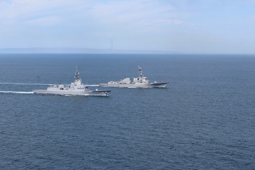 HMAS Sydney and USS John Finn Conduct Group Sail