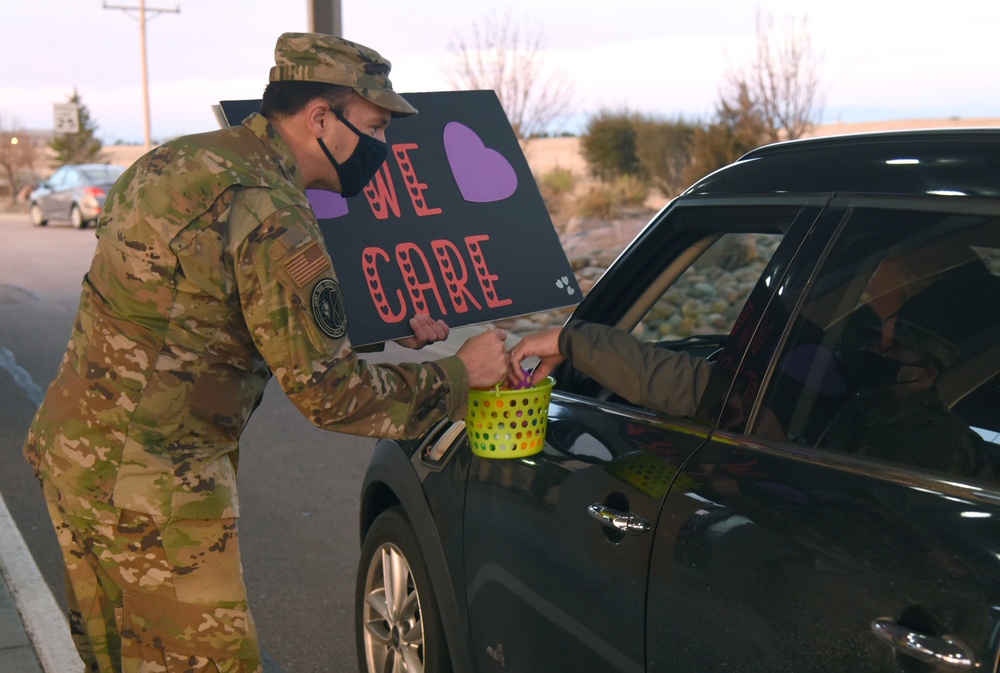 Shriever leadership hand out Easter eggs