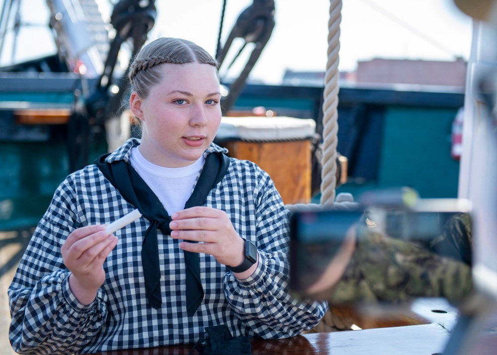 Logistics Specialist 3rd Class Patience Jones gives a virtual tour and Easter egg hunt aboard USS Constitution