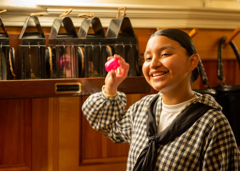 Aviation Structural Mechanic Seaman Jennifer Martinez gives a virtual tour and Easter egg hunt aboard USS Constitution