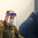 U.S. Army Soldiers aid in administering COVID-19 vaccines at Trenton Central High School CVC
