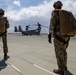 Green Berets jump out of Marine Corps helicopter