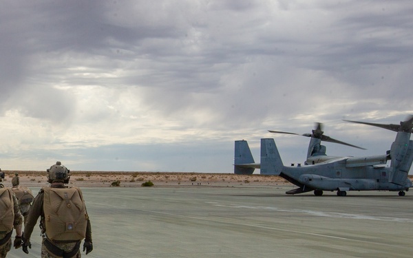 Green Berets jump out of Marine Corps helicopter