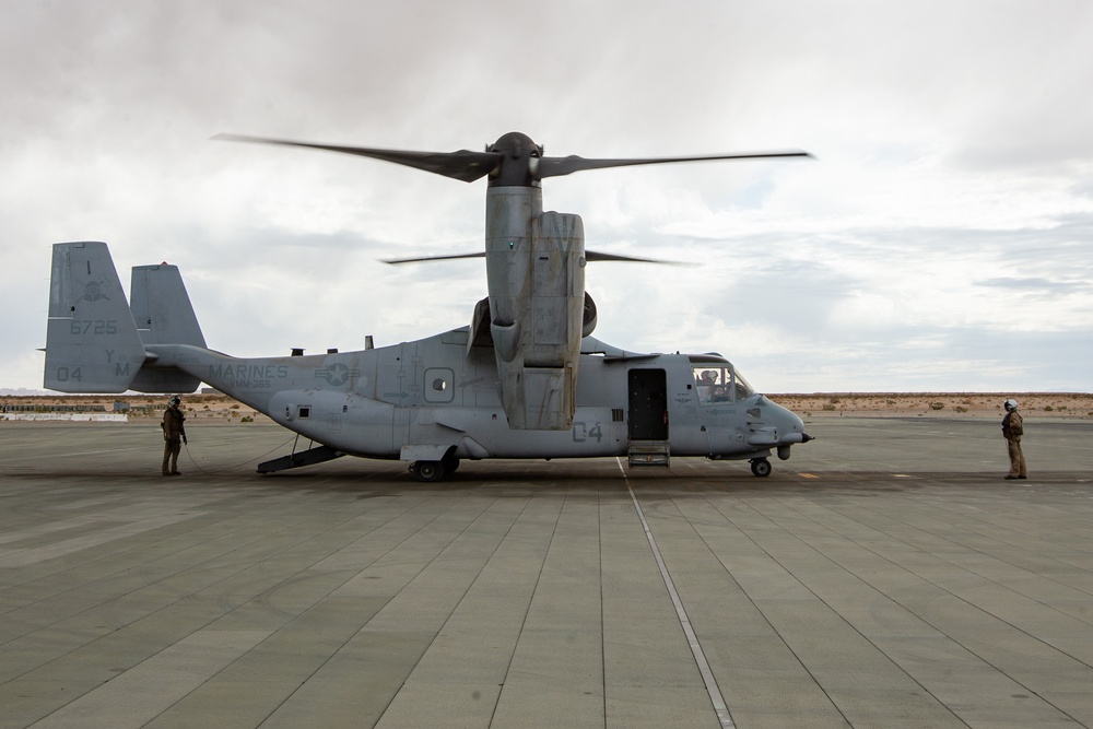 Green Berets jump out of Marine Corps helicopter