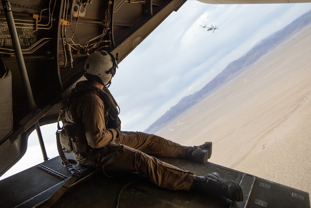 Green Berets jump out of Marine Osprey