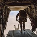 Green Berets jump out of Marine Corps helicopter