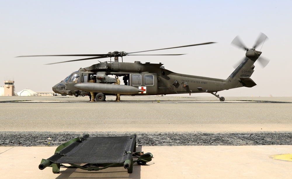 Engineers of Task Force Iron Castle HHC 16th Engineer Brigade, Aviators of 28th Expeditionary Combat Aviation Brigade (ECAB), and Soldiers from Kuwait Land Forces collaborated for a joint medical evacuation (MEDEVAC) training exercise.