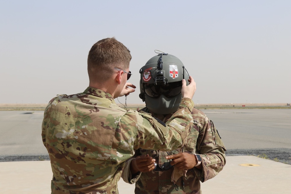 Engineers of Task Force Iron Castle HHC 16th Engineer Brigade, Aviators of 28th Expeditionary Combat Aviation Brigade (ECAB), and Soldiers from Kuwait Land Forces collaborated for a joint medical evacuation (MEDEVAC) training exercise.