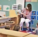 Garrison commander's spouse supports 2021 Month of the Military Child with book reading at Fort McCoy