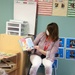Garrison commander's spouse supports 2021 Month of the Military Child with book reading at Fort McCoy