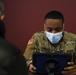 Service Members aid vaccination efforts at the Maureen Collier Memorial Senior Citizens Center CVC