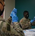 Service Members aid vaccination efforts at the Maureen Collier Memorial Senior Citizens Center CVC