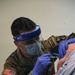 Service Members aid vaccination efforts at the Maureen Collier Memorial Senior Citizens Center CVC