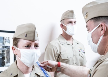 210126-N-TE695-0005 NEWPORT, R.I. (April 1, 2021) Limited Duty Officer/Chief Warrant Officer (LDO/CWO) Academy class conducts a uniform inspection
