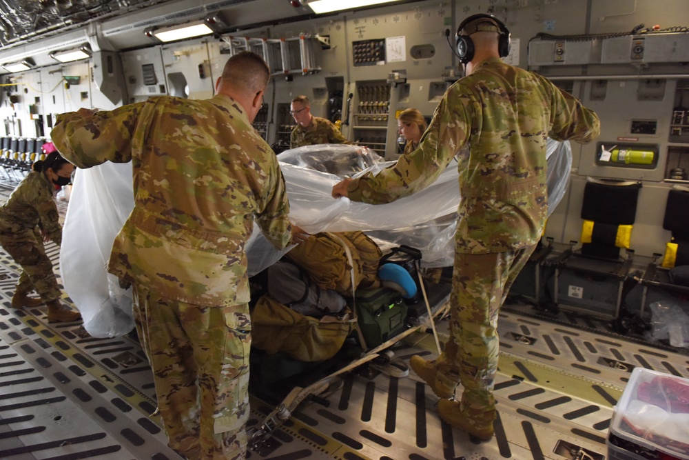 62 AW airlifts COVID-19 patient to Texas