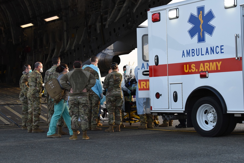 62 AW airlifts COVID-19 patient to Texas