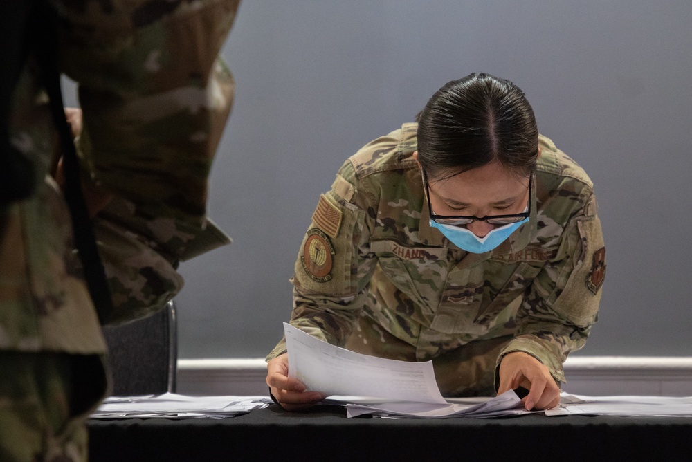 U.S. Air Force Airmen receive a FEMA-RSOI brief at the JTF-CS operations center in Hyattsville, MD