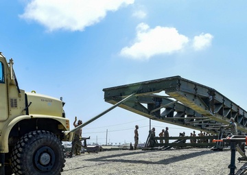 NMCB-3 Launches Medium Girder Bridge