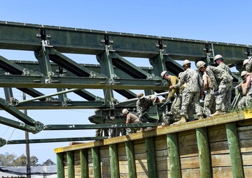 NMCB-3 Launches Medium Girder Bridge