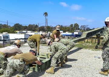 NMCB-3 Launches Medium Girder Bridge