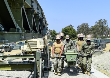 NMCB-3 Launches Medium Girder Bridge