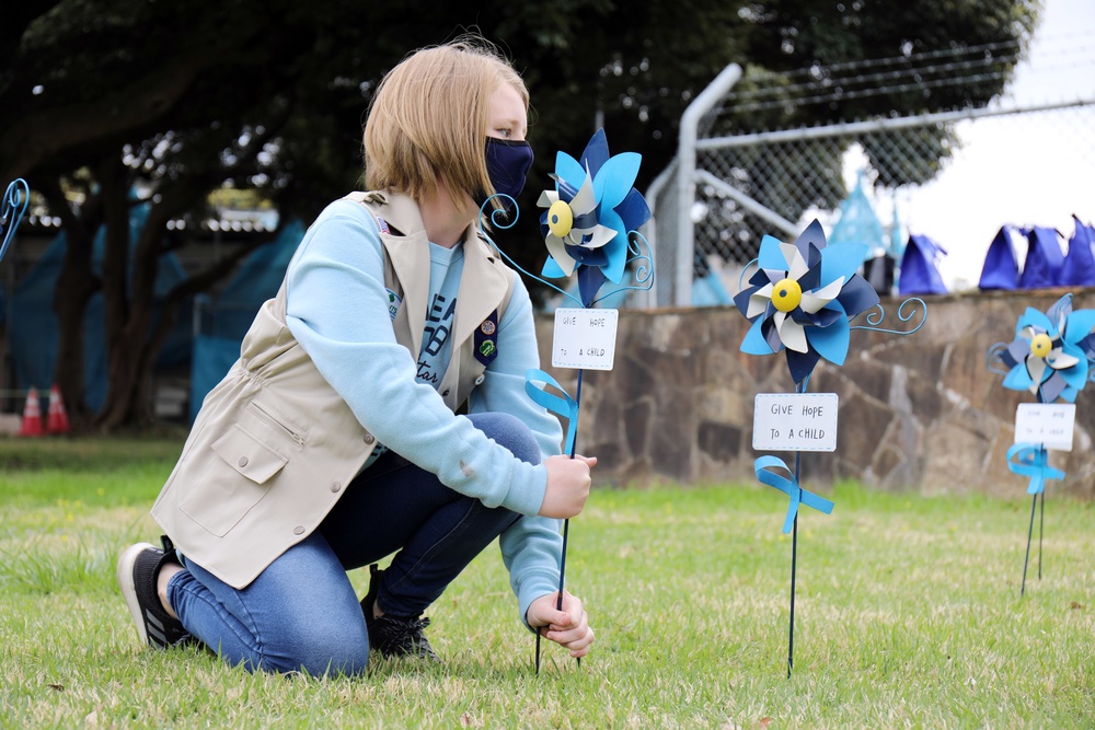 Camp Zama Girl Scouts plant pinwheels to raise child abuse awareness