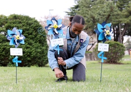 Camp Zama Girl Scouts plant pinwheels to raise child abuse awareness