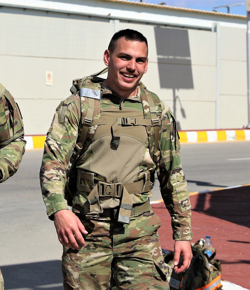 Spc. Christopher Dame finishes the Norwegian Foot March
