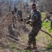 KFOR Soldiers help clean up cemetery