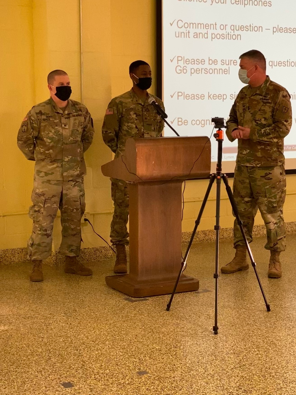 Maj. Gen. David Ling, commanding general of the 79th Theatre Sustainment Command present 451st Sustainment Command (Expeditionary) Soldiers his commander’s coin