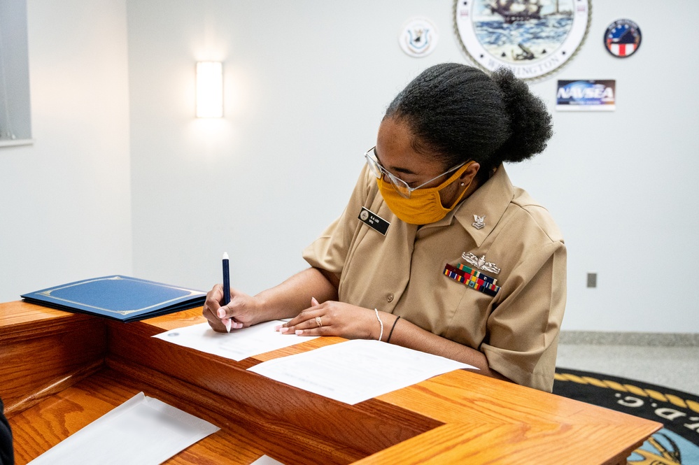 CS2 Sheniqua Lee reenlistment ceremony