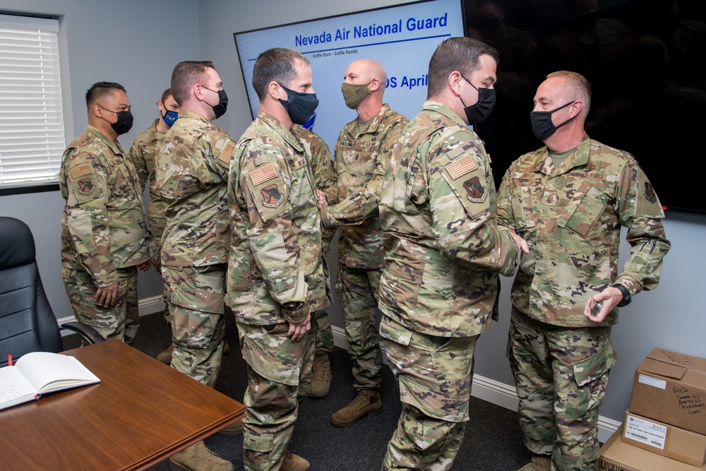232 OS Enlisted Members Receive Command Chief Coin