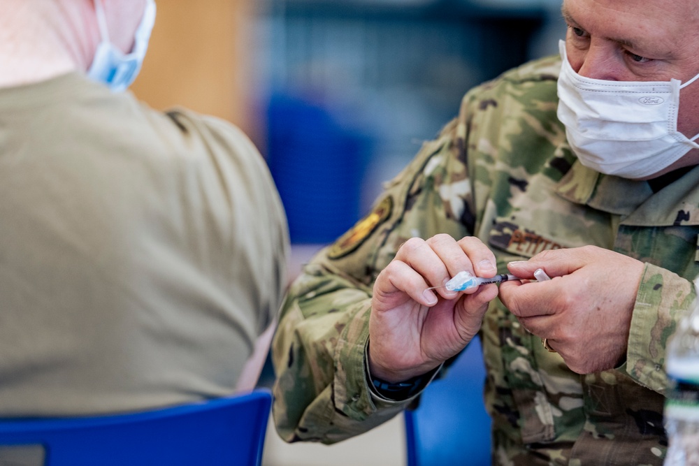 Michigan National Guard, Administers the COVID-19 Vaccine to Michiganders.