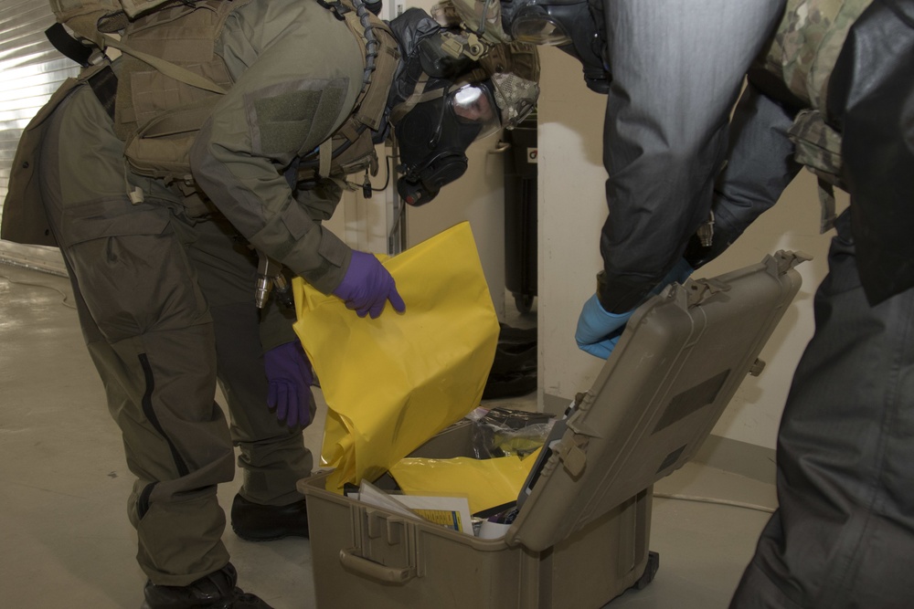 U.S. Special Operations Forces test for hazardous materials during IS 21