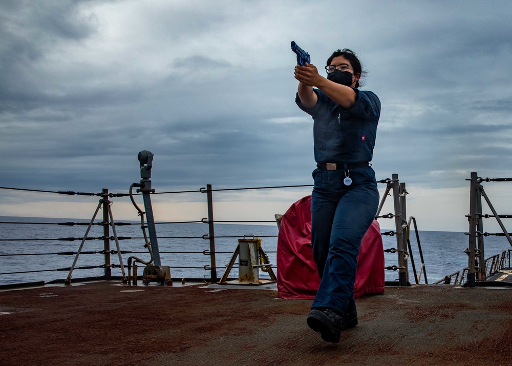 Logistics Specialist Seaman Ingrid Santiago practices combat tactics during Security Reaction Force Basic Training