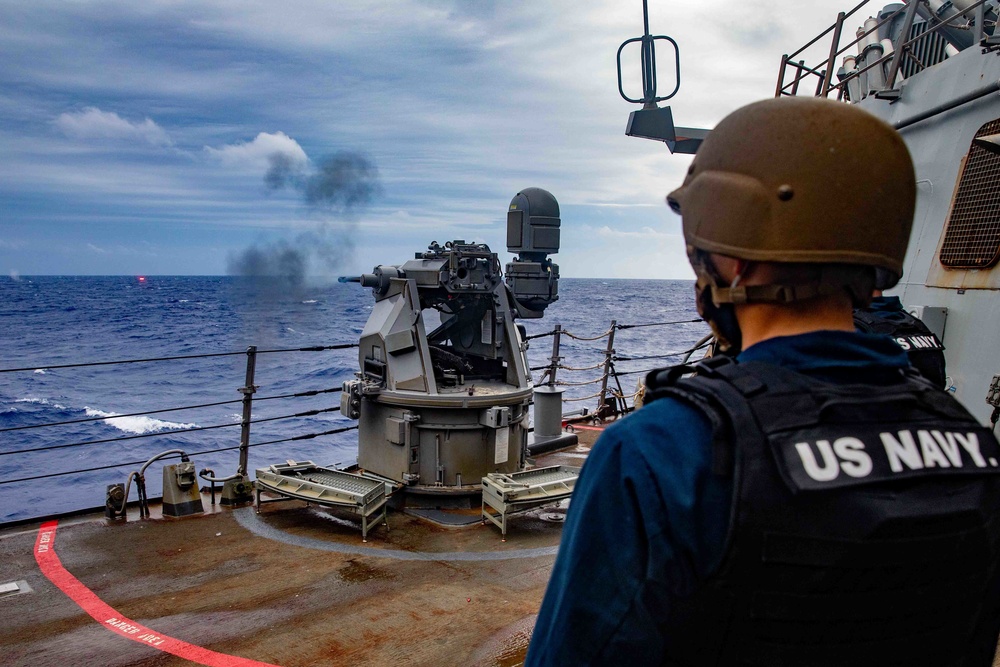 Sailors aboard USS Barry observe a live-fire exercise