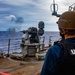 Sailors aboard USS Barry observe a live-fire exercise