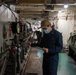 U.S. Sailor performs maintenance