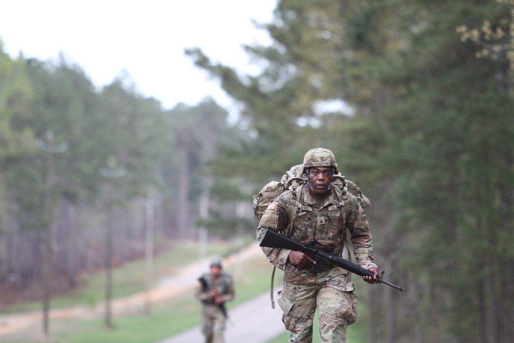 3d MCDS Best Warrior Competitors complete a 12-mile foot march