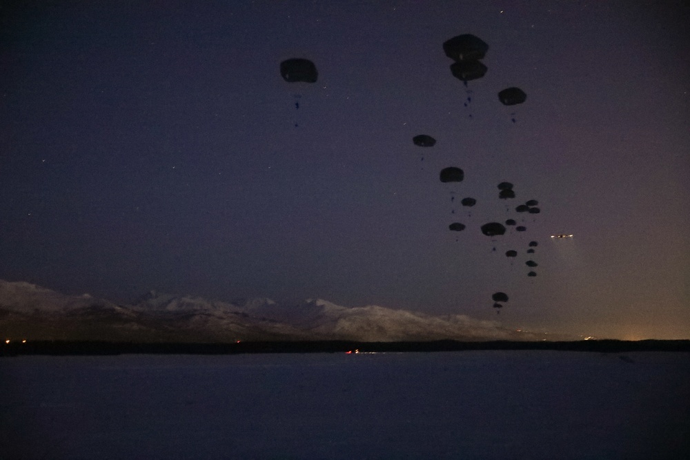 Spartan paratroopers jump at night