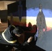 Task Force Spartan Soldier paints T-wall after winning design competition