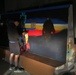 Task Force Spartan Soldier paints T-wall after winning design competition