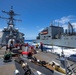 USS Barry conducts a replenishment-at-sea with USNS Charles Drew