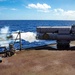 USS Barry conducts a live fire exercise with a torpedo launcher