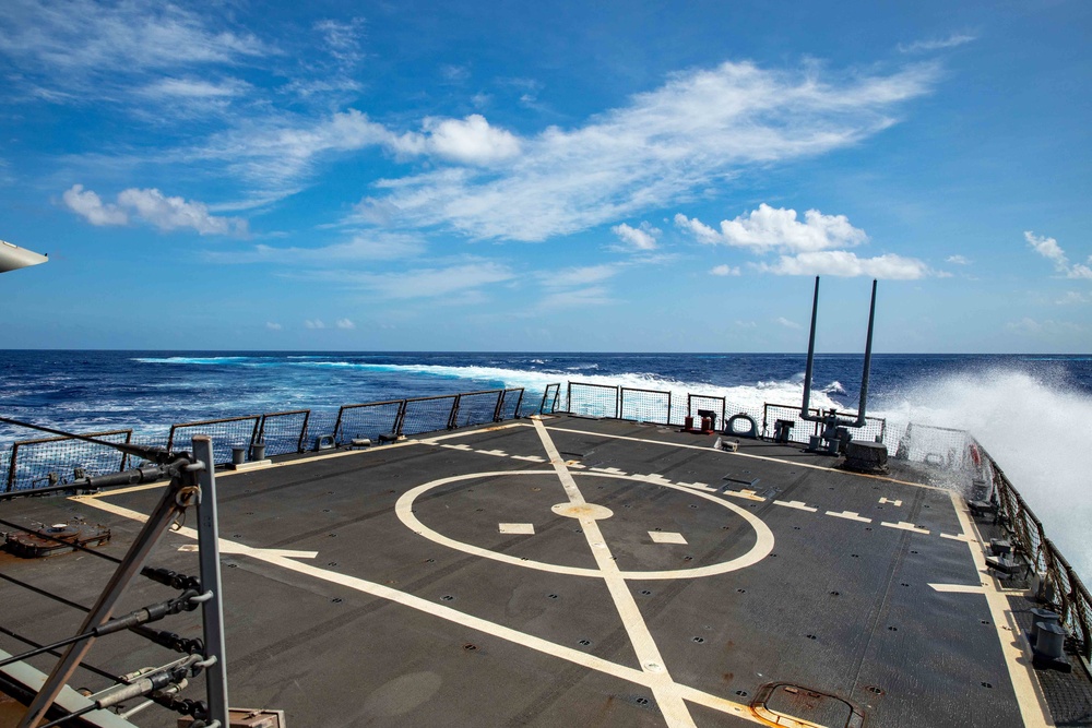 USS Barry performs an evasive maneuver during an anti-submarine warfare exercise