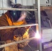 NMCB 11 Welds Gear Rack for Supply on Camp Covington