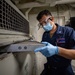 Operations Specialist 3rd Class Gabriel Franco conducts maitenance aboard the USS Barry