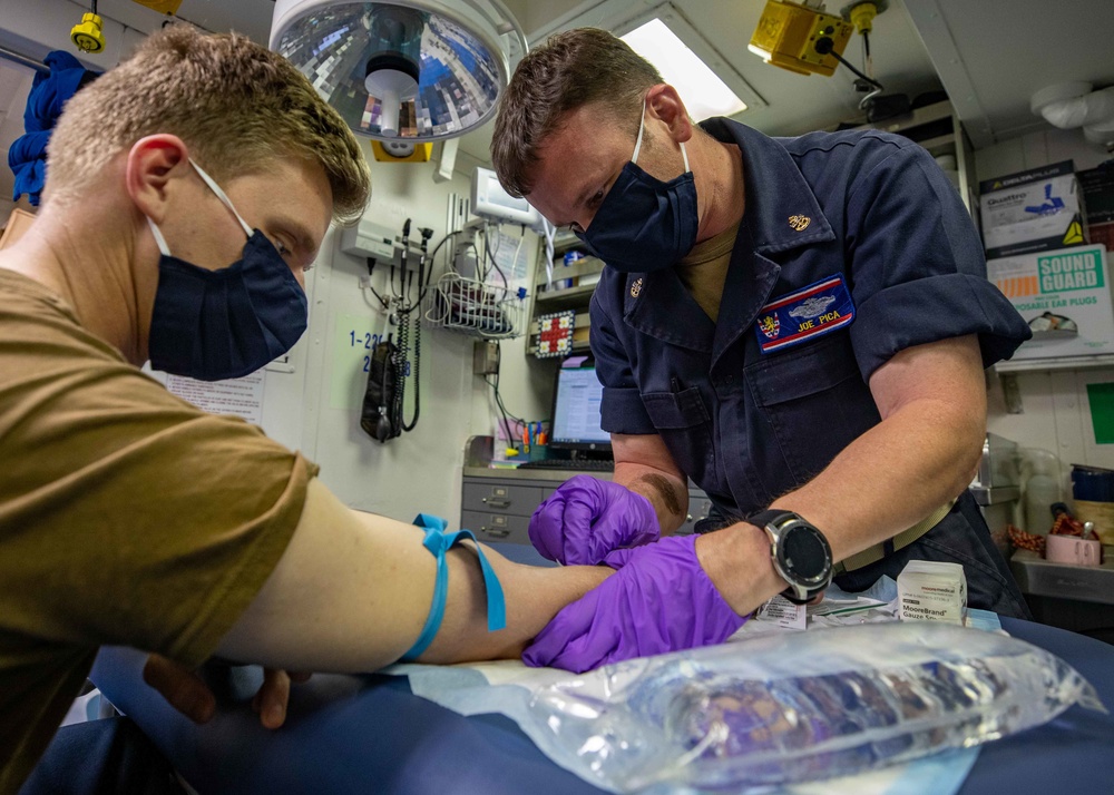 Hospital Corpsemen aboard the USS Barry conduct IV training