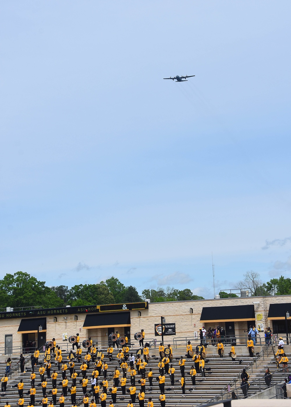 Football game flyover symbolizes partnership, promise