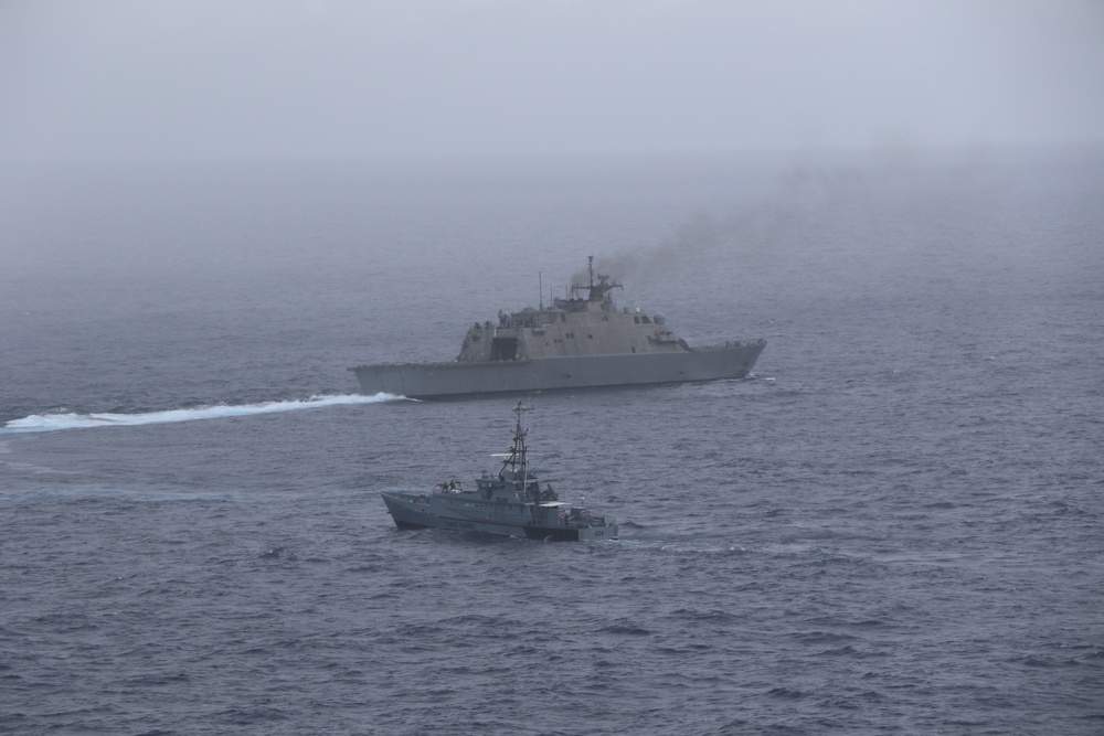 USS Wichita (LCS 13) and Jamaica Defence Force Coast Guard patrol vessel HMJS Cornwall conduct a live-fire exercise